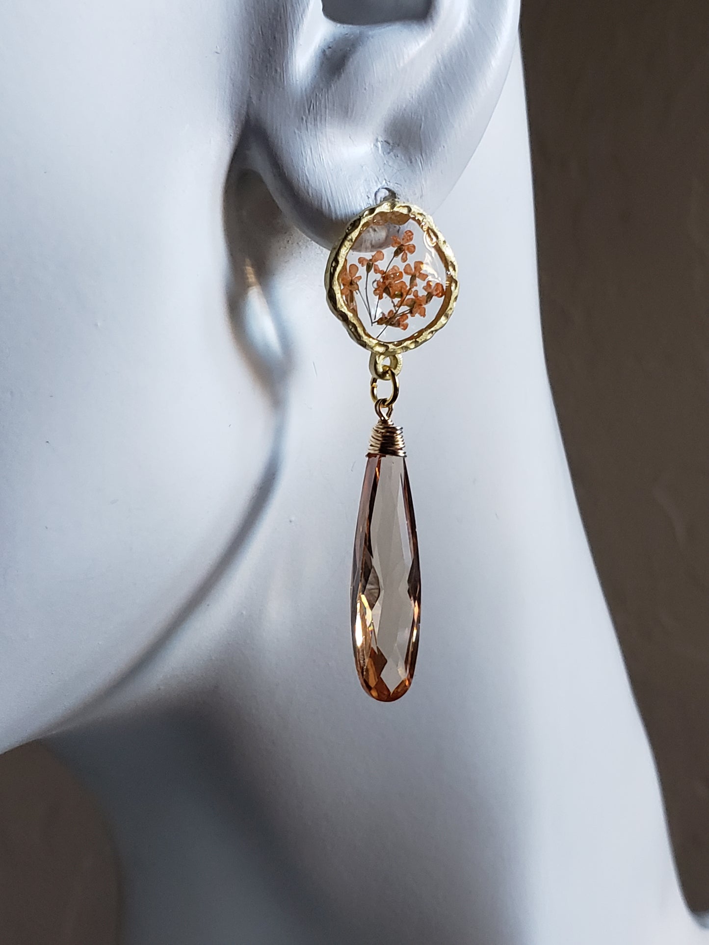 Peach floral resin studs with peach cubic zirconia.  Pantone color of the year