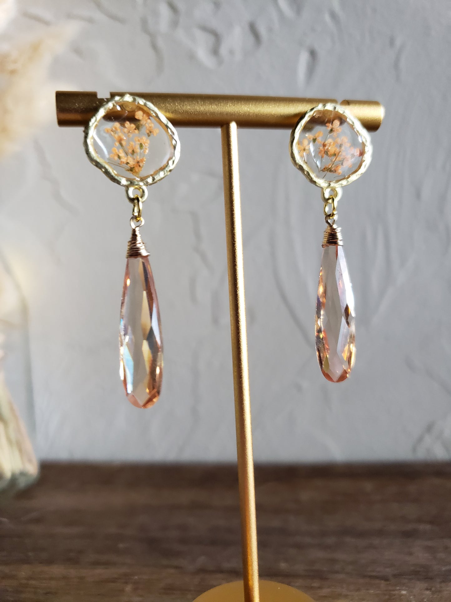 Peach floral resin studs with peach cubic zirconia.  Pantone color of the year