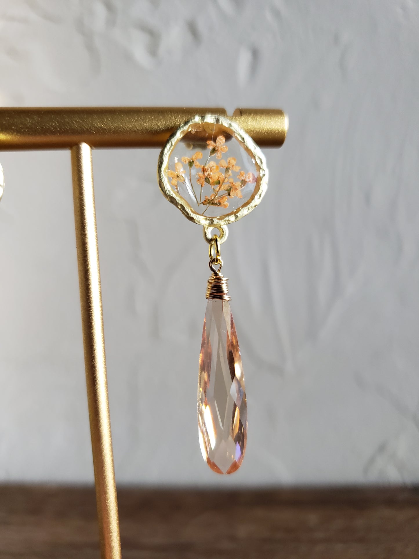 Peach floral resin studs with peach cubic zirconia.  Pantone color of the year