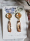 Peach floral resin studs with peach cubic zirconia.  Pantone color of the year