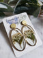 White flower bunch resin statement earrings in gold