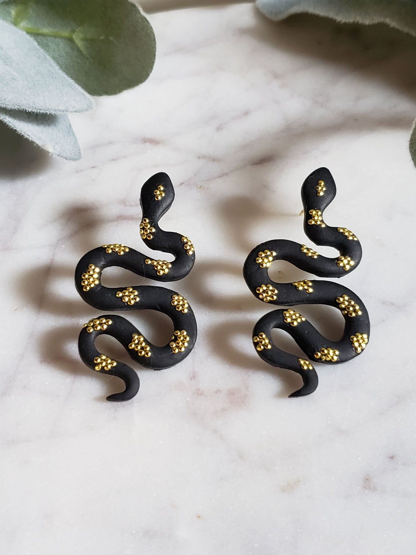 Snake polymer clay earrings in gold and black or silver and black