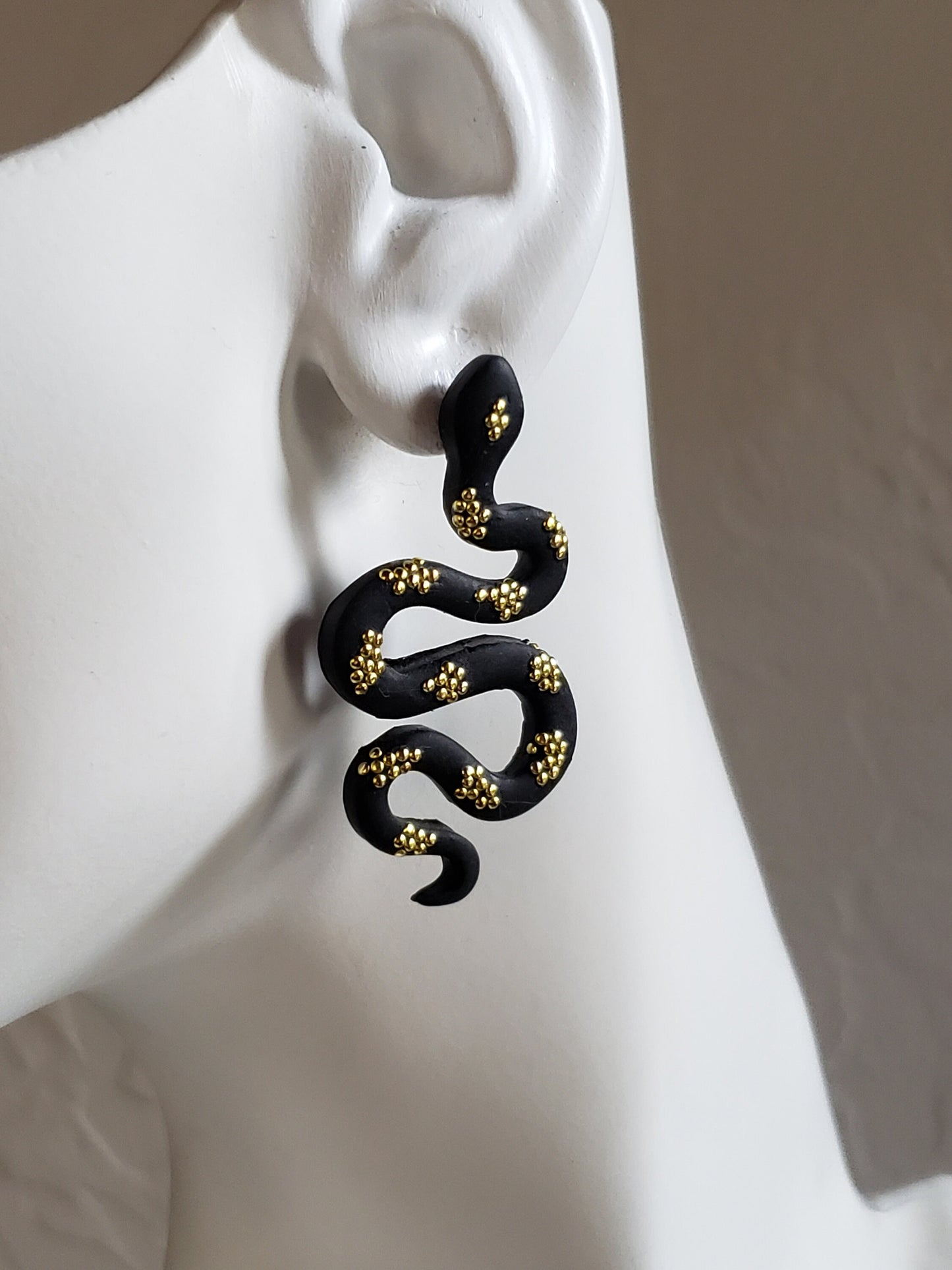 Snake polymer clay earrings in gold and black or silver and black