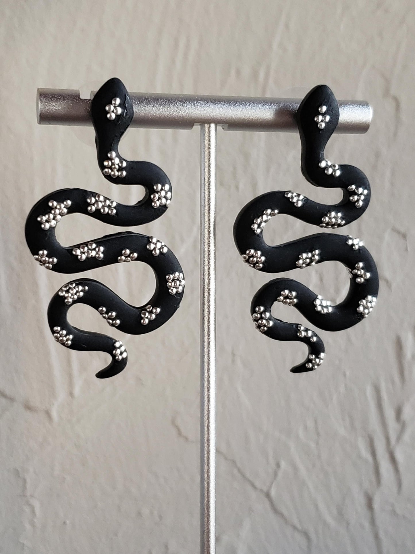 Snake polymer clay earrings in gold and black or silver and black