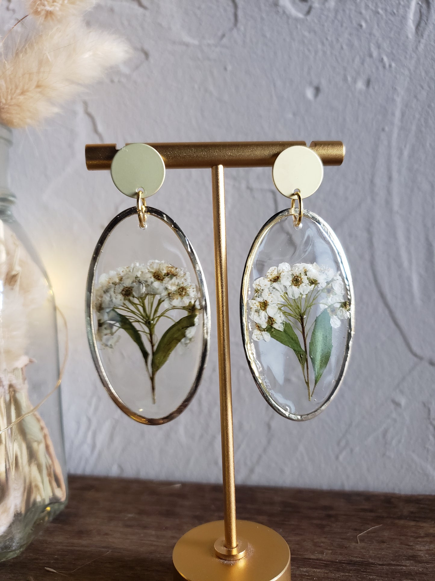 White flower bunch resin statement earrings in gold